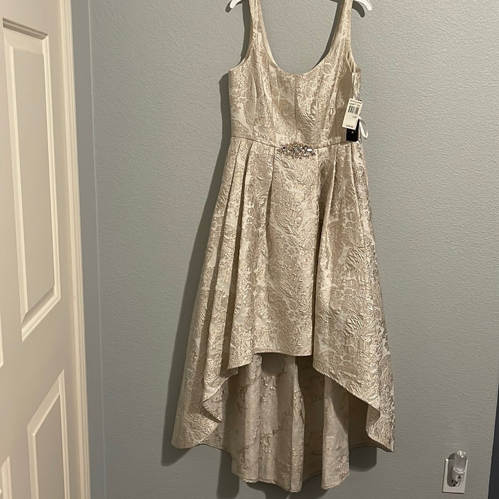 New White and gold Betsy Adam gown in a size 12p